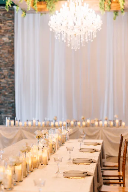 Candles and place settings down a long table