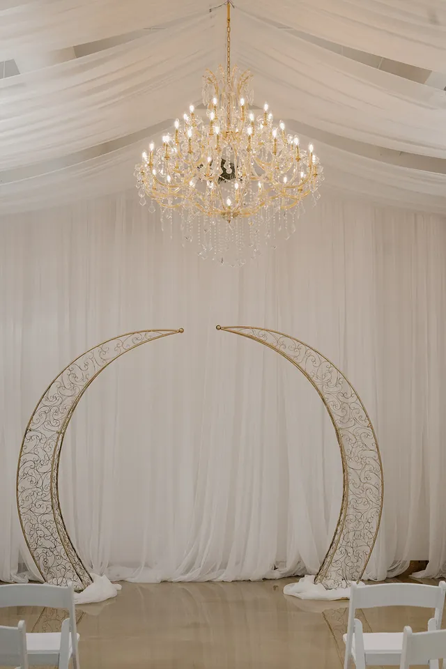 The Halo Room — ceremony arch beneath the drapery