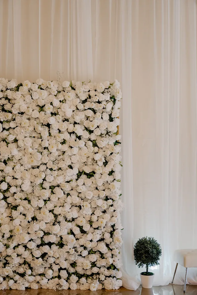 The white flower wall in Solara Hall